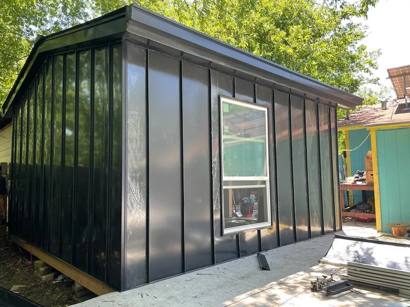 Black standing seam metal wall panels for Roof Inspection in Keyport